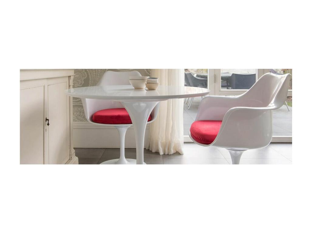 Glossy white armchair with red tulip petal fabric cushion